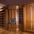 Beautiful Honduras Mahogany is used in this complex wall unit that takes advantage of an alcove in the wall.